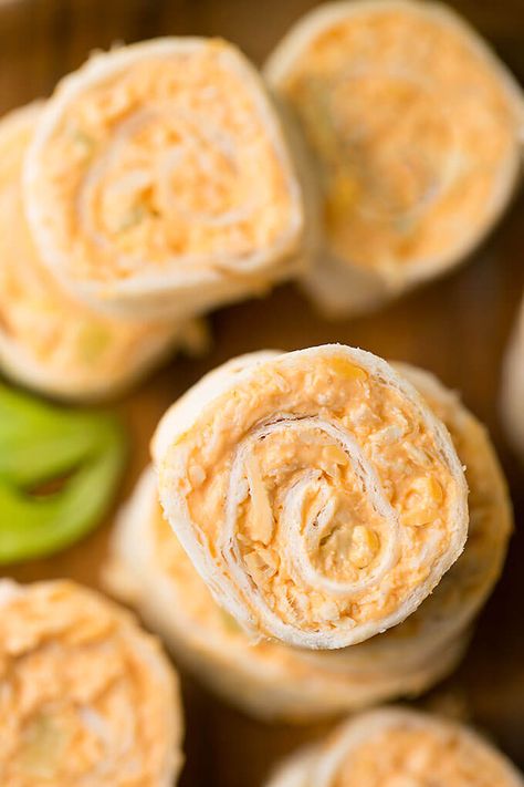 Buffalo Chicken Pinwheels have the wing flavor in a neat pinwheel appetizer. Great for a party or game day! simplyhappyfoodie.com #gamedayfood #pinwheelrecipe #buffalochicken Tortilla Pinwheel Appetizers, Pinwheel Appetizer, Party Pinwheels, Buffalo Chicken Pinwheels, Horderves Appetizers, Simply Happy Foodie, Chicken Pinwheels, Tortilla Pinwheels, Pinwheel Appetizers