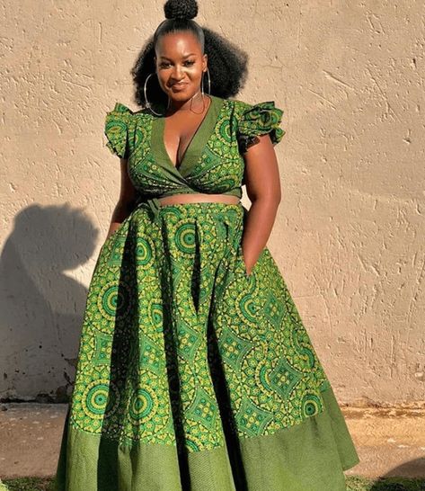 Lady In Plunging Neck Shweshwe Wrap Top and Flared Skirt | Clipkulture | Clipkulture Modern Traditional Dresses, Fashion Kitenge, Seshweshwe Dresses, Seshoeshoe Dresses, Isi Agu, Dresses For Plus Size, African Wears, South African Traditional Dresses, Kitenge Dress