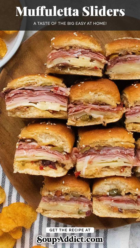 Invoke the spirit of New Orleans with these piled-high Muffuletta Sliders! Hawaiian rolls stuffed with hearty meats and melty cheeses, and accented with a briny spread of olive salad. A Big Easy finger food taste treat for Mardi Gras parties and appetizers at game day gatherings! Get the recipe at SoupAddict.com. Jason’s Deli Muffuletta, Hawaiian Roll Sliders Muffaletta, Mardi Gras Sandwiches, New Orleans Finger Food, Muffaletta Sandwich Sliders, Easy Muffaletta Sandwich, Lsu Tailgate Food, Muffleta Sandwich, New Orleans Sandwich