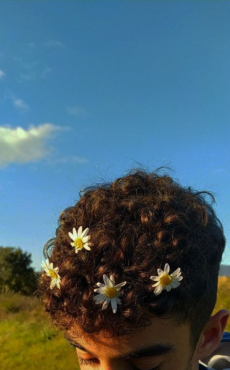 Men With Flowers In Their Hair, Male Curly Hair Aesthetic, Men Brown Curly Hair, Short Curly Hair With Flowers, Curly Hair Boyfriend Aesthetic, Curly Hair Boys Aesthetic, Dark Curly Hair Boy, Curly Hair Aesthetic Boy, Dark Curly Hair Men