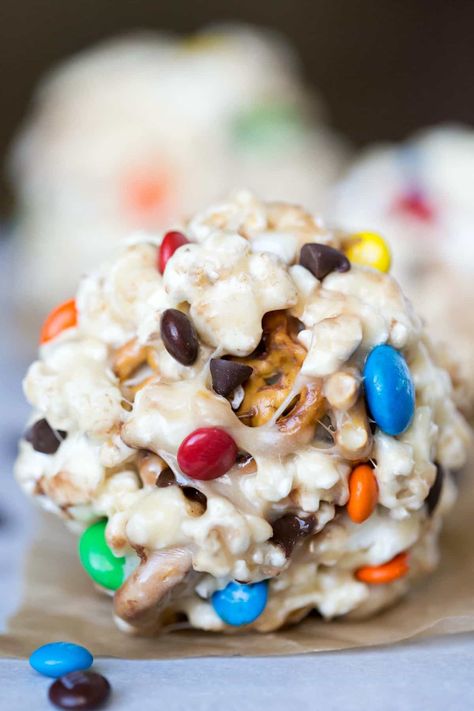 Popcorn ball on a sheet of brown parchment paper Popcorn Ball Recipe, Fall Yummies, Popcorn Ball, Popcorn Balls Recipe, Marshmallow Popcorn, Kids Halloween Food, Salty Popcorn, Snack Mixes, Baker's Rack