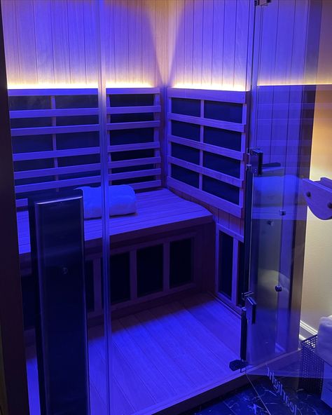 Our stunning locker room isn’t just for storing your gym bag! 🔥 Take your post-workout relaxation to the next level with our state-of-the-art infrared sauna featuring chromotherapy! Infrared saunas offer a deeper, more gentle heat that penetrates your muscles, promoting relaxation, detoxification, and improved circulation. Chromotherapy bathes the sauna in calming colored light, further enhancing your wellness experience. The best part? This luxurious amenity is available to BOTH members ... Infared Lights, Wellness Experience, Home Gym Design, Infrared Sauna, Gym Design, Locker Room, Post Workout, Home Gym, Light Red