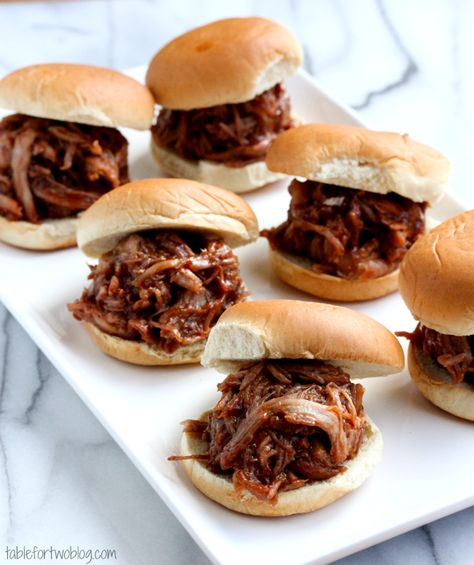 Mini BBQ Pork Sliders {Crockpot} Totally adorbs for upcoming get togethers! The best part? They can be made inside JUST IN CASE spring hasn't arrived at your home yet. via Table for Two #crockpot #makeahead Pork Sliders Crockpot, Bbq Pork Crockpot, Pulled Turkey, Pulled Pork Sliders, Summer Food Party, Pork Sandwiches, Football Snacks, Pork Sliders, Crockpot Pork