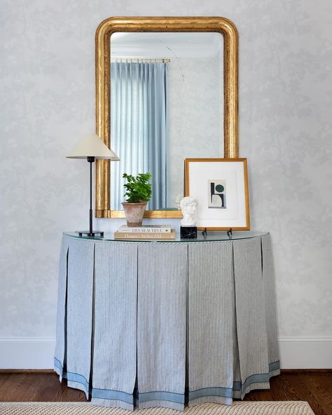 Lark & Grace Interiors’s Instagram post: “Tailored to perfection 💙 • • • • • #houstoninteriordesign #interiordesign #westuniversity #interiordesigner #jasperfabrics #custom #design…” Demilune Table Foyer, Chair Slipcovers Dining, Skirted Table Entryway, Console Table Skirt, Skirted Entry Table, Skirted Console Table, Skirted Side Table, Renee Bouchon, Drapery Workroom