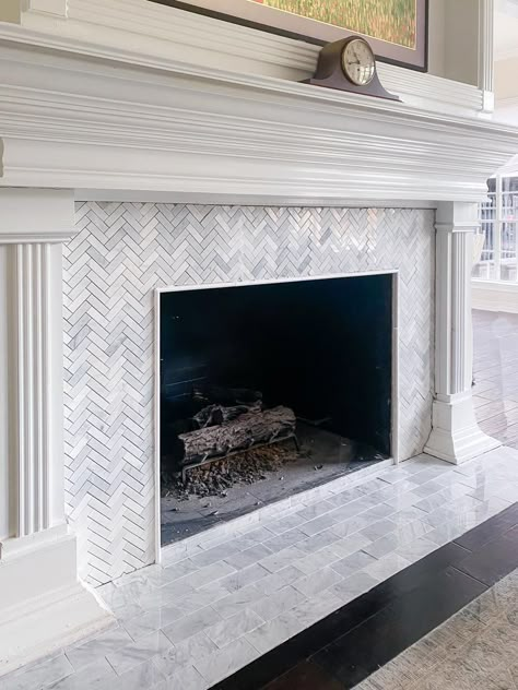 How to Retile Your Old Fireplace Herringbone Tile Fireplace, Subway Tile Fireplace, Herringbone Fireplace, Pencil Tile, Marble Herringbone Tile, Frame Tv Frame, Marble Subway Tile, Brass Fireplace Screen, Hearth Tiles