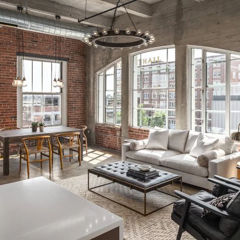 Urban Loft - Industrial - Living Room - Kansas City - by Gary Brown Homes LLC | Houzz Urban Industrial Living Room, Urban Loft Apartment, Concrete Floors Living Room, Wood Fireplace Surrounds, Loft Apartment Decorating, Industrial Living Room, Urban Living Room, Green House Design, Brick Interior