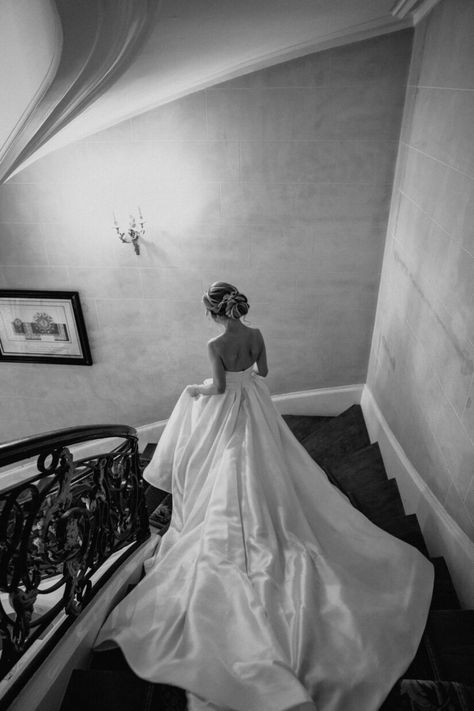 Bridal Portraits Aesthetic, Bride Coming Down Stairs, Long Train Wedding Dress Stairs, Unique Bridal Pictures, Wedding Dress Hanging Photography, Snowy Wedding Photos, Ballgown Wedding Photos, Bride Walking Down Stairs, Wedding Photos Ballgown