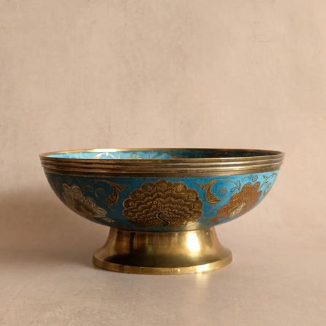 AVAILABLE ✨Solid Brass & Enamel Peacock Pedestal Bowl✨ 🦚 A colourful and elegant brass bowl with a peacock motif and blue-ish, green, teal accents 🦚 The surface is unfinished so the enamel has a lovely matte finish that really complements the patina of the brass 🦚 A curved pedestal, very heavy, solid piece 💸 price and more details/photos on website 🇬🇧 FREE UK p+p #vintagebrass #peacockdecor #brassdecor #vintagehomewares #vintagehomegoods #vintagehomedecor Peacock Motif, Brass Bowl, Peacock Decor, Teal Accents, Pedestal Bowl, Metal Candle Holders, Brass Decor, Metal Candle, Vintage Home Decor