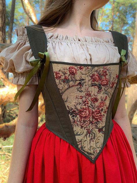 corset top, underbust custom corset, renaissance ren faire dress, 18th century stays, victorian rococo corset, plus size 1830s corset dress  We offer free express delivery for this item. The material for this corset is limited, so place your order now to ensure availability.  Corsets "yourQUANTUM" are designed by an experienced specialist. You can be assured that they will accentuate all the merits of your figure and become a splendid addition to your wardrobe.  This corset model is reversible! The front side features tapestry-like floral patterns, while the reverse side is made of linen or cotton, depending on the model. CORSET MATERIALS: - Tapestry + linen for the green corset and tapestry + polyester + cotton for the champagne-colored corset -Satin ribbons - Solid whalebone stay in ever Corset Materials, Ren Faire Corset, Reversible Corset, Corset Cottagecore, Tapestry Corset, Fairy Corset, Custom Corset, 18th Century Stays, Corset Plus Size