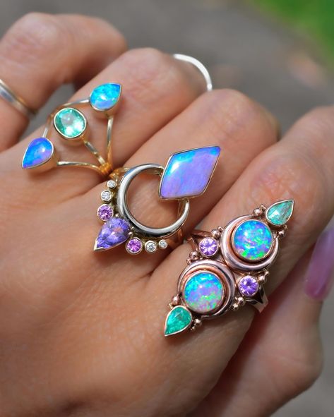 This collection is so exciting! I’d love to know your favorites! I have a comeback of three of my favorite designs (La Luna Opal Pendant, La Luna Grande Opal Ring and Floating Trinity Opal Rings) which will be the final versions of these designs for the foreseeable future as it’s getting harder to source opals and sacrificing their shape and size to cut them for these bespoke designs. 1) Group photo 2) Dusty rose opal ring with precision cut spinel, emeralds, and diamonds in real gold 3)... Crystal Engagement Rings, Australian Opal Ring, Instagram Message, Portfolio Ideas, Heirlooms Jewelry, Dope Jewelry, Gold Moon, Moon Flower, Group Photo