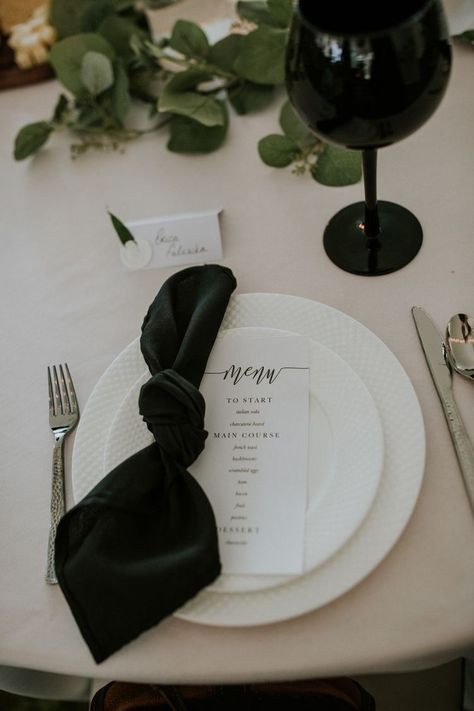 Black Wedding Napkins Place Settings, Black Table Cloth With White Lace Overlay, Black Satin Napkin Wedding, Wedding White Tablecloth Black Napkins, Black Napkin Wedding Place Settings, Minimalist Rehearsal Dinner Decor, White Napkin Black Menu Wedding, White Table Black Runner, Wedding Table Black Napkins