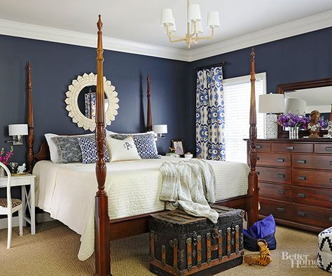 A classic combo of navy and white is perfect for a traditional space. Dark Wood Bedroom, Navy Bedrooms, Navy Blue Bedrooms, Dark Wood Furniture, Four Poster Bed, Dark Furniture, Four Poster, Poster Bed, Bedroom Paint Colors