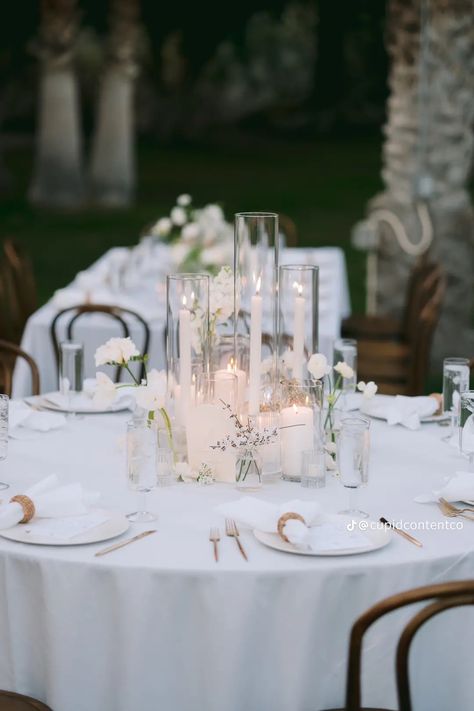 Minimalist White Centerpiece, Large White Floral Centerpieces, Kings Table Florals, Modern Wedding Round Table Decor, Minimal Floral Centerpieces Wedding, Hightop Cocktail Tables Wedding, Dried Wedding Centerpieces, Candle Wedding Centerpieces Round Tables, Light And Airy Wedding Decor