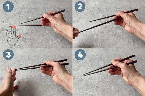 Looking to learn how to hold chopsticks? With these easy steps and helpful tips, you'll be confidently using chopsticks at the dinner table in no time. How To Eat With Chopsticks, How To Hold Chopsticks, Hold Chopsticks, How To Use Chopsticks, Using Chopsticks, Household Help, Japanese Chopsticks, Chopstick Rest, Lunch To Go