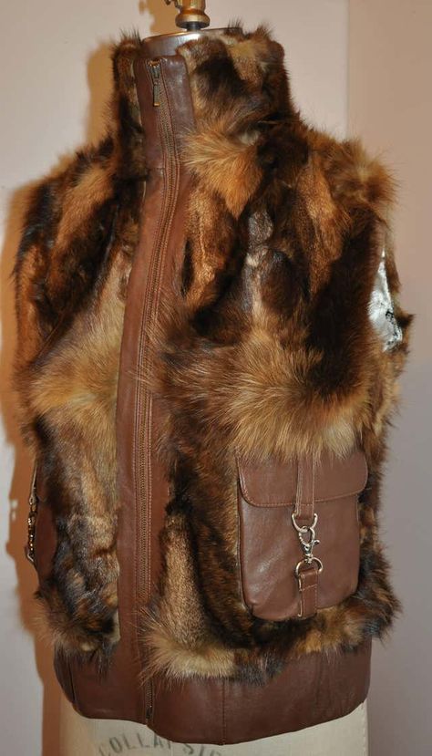 For Sale on 1stDibs - High collar zippered front fur vest is accented with brown leather throughout. The high collar measures 4'; with two patch pockets in front. The fur vest Highschool Fashion, Garbage Dump, High School Fashion, Wardrobe Pieces, Fur Vest, Real Fur, The High, High Collar, Design Inspo