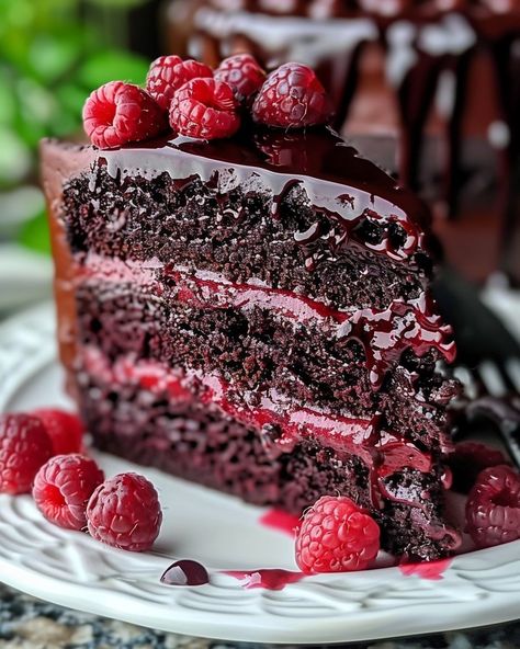 A luscious cake that combines the rich flavor of chocolate with the tanginess of raspberry. Perfect for celebrations or indulging in a delightful dessert, this cake features a moist chocolate sponge, raspberry filling, creamy frosting, and a decadent chocolate ganache drip. Visit website for full recipe at https://northeastnosh.com/f/chocolate-raspberry-cake #northeastnosh #chocolatecake #chocolatedessert #chocolate #chocolateraspberry #ganache #chocolateganache #darkchocolate #milkchocolat... Chocolate Raspberry Cake Recipe, Chocolate Ganache Drip, Raspberry Cake Recipes, Ganache Drip, Raspberry Torte, Raspberry Frosting, Creamy Frosting, Raspberry Desserts, Brunch Desserts