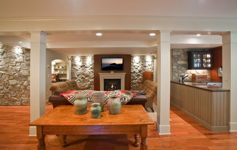 ... focal point of the basement living area. The rustic wall is extended to a small kitchenette. Stones are also used for the wall facing the stairs. Basement In Law Suite, Pretty Basement, Mother In Law Suite, Small Kitchenette, Basement Redo, Basement Inspiration, Basement Apartment, Small Basements, Guest Houses