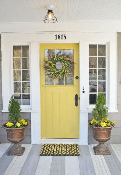 front door color is Benjamin Moore Banana Cream #275 Yellow Front Door, Yellow Front Doors, Front Porch Makeover, Front Door Makeover, Farmhouse Front Door, Door Paint Colors, Porch Makeover, Painted Front Doors, Grey Houses