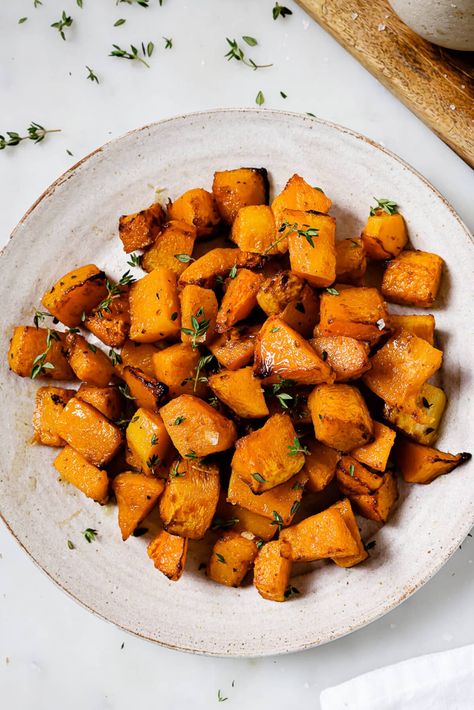 A serving platter of air fryer butternut squash garnished with thyme. Butternut Squash Recipes Roasted Air Fryer, Air Fry Butternut Squash Recipes, Butter Ut Squash Recipes Air Fryer, Air Fried Butternut Squash, Air Fry Butternut Squash, Butternut Squash Air Fryer, Beet Orange Salad, Air Fryer Cod Recipe, Air Fryer Cod