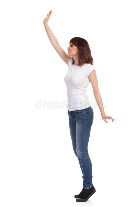 Young Woman In White T-shirt And Jeans Is Standing TipToe And Waving Hand. Side View. Stock Photo - Image of length, enjoy: 102997358 Waving Hand Pose Reference, Hand Side View, Waving Hand, Walking Poses, Woman In White, People Poses, Anatomy Poses, Body Reference Drawing, Hand Reference