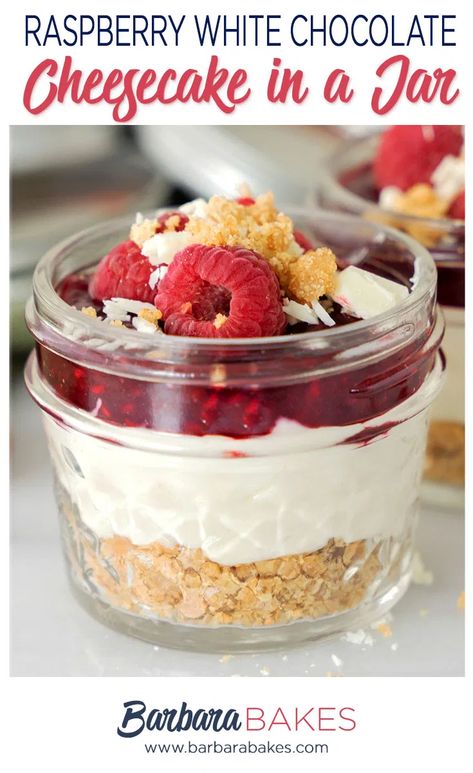 Decadent White Chocolate Raspberry Cheesecake in a Jar is a hand-held no-bake dessert with cream cheese filling, fresh raspberry purée, and crunchy graham cracker crust. Dessert With Cream Cheese, Raspberry White Chocolate Cheesecake, Raspberry No Bake Cheesecake, White Chocolate Raspberry Cheesecake, Mason Jar Desserts, Raspberry White Chocolate, Homemade Strawberry Sauce, Chocolate Raspberry Cheesecake, Cheesecake In A Jar