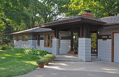 A new entrance was created at the former porch, located between living room and garage. Ranch House With Front Porch, Ranch House Exterior Remodel, 1960s Ranch House Exterior, 70s House Remodel, Ranch House Addition, Ranch House Additions, House With Front Porch, Low Pitch Roof, Modern Front Porches