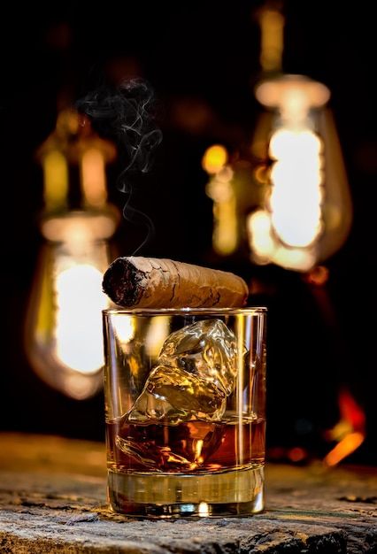 Whiskey in glass and cigar on wooden tab... | Premium Photo #Freepik #photo #whisky-glass #whisky #whiskey-glass #cognac Whiskey Asethic, Whiskey Neat Aesthetic, Whiskey Glass Aesthetic, Cigars And Whiskey Aesthetic, Cognac Aesthetic, Whisky And Cigars, Whisky Aesthetic, Whiskey Aesthetic, Premium Whisky