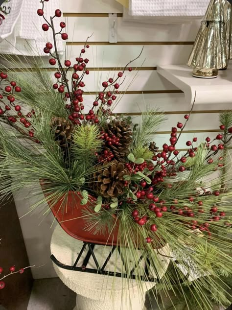 Christmas Decor With Sleigh, Christmas Sleigh Floral Arrangement, Sleigh Arrangements, Christmas Flower Arrangements Ideas, Christmas Sleigh Centerpiece, Flower Wall Decor Ideas, Floral Christmas Centerpieces, Christmas Sleighs, Christmas Sleigh Decorations