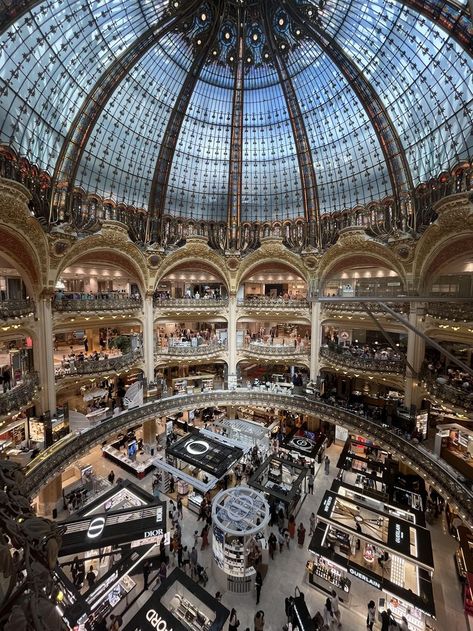 Picture of Galeries Lafayette in Paris, France. A beautiful old building with a round glass ceiling and nice light fixtures. Several floors filled with different boutiques from hing-end designers like Chanel; Dior, Hermes, and many more! Pictures In Paris, Top Floor, Galeries Lafayette, Beautiful Place, The Building, Top View, Most Beautiful Places, Department Store, High Fashion