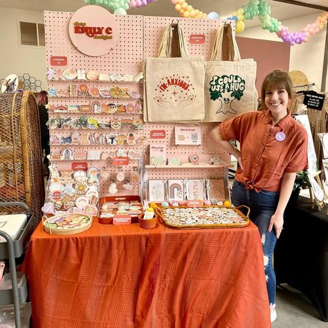 @shop.emilyc.designs shared a photo on Instagram: “MARKET DAY!🧡 I just realized I’ve worn orange to every single market. Can you tell it’s my favorite color?😄 come visit me at the…” • Apr 16, 2022 at 3:47pm UTC Craft Store Booth, Art Display Booth Ideas, Artist Market Booth, Colorful Booth Design, Art Market Table Display, Art Market Stall Display Ideas, Art Booth Design, Market Stands Display, Art Market Set Up