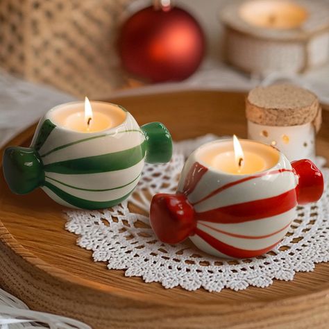 PRICES MAY VARY. 【Candle Stick Holder Bundle】:Candle holder decor set of 2,red + green,made of high quality ceramic,with great care by our exquisite craftsman.It’s not only a candle holder, but also a special craft enhancing the beauty of your home decoration. 【Multifunctional】: The inner diameter of the candle holders is 1.5 inches.The versatile candle stick fit most standard taper candles, tea candle,chime candles and flameless colorful LED candles up to 1.5 inches in diameter,compact and port Clay Candlestick Holders, Christmas Decor Ideas Red And Green, Pottery Candles, Pottery Products, Candy Shapes, Chime Candles, Christmas Ceramics, Christmas Candlesticks, Christmas Dining Table Decor