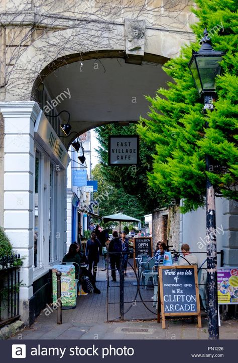 Download this stock image: Around Clifton Bristol England UK Clifton arcade and East Village cafe - PN1226 from Alamy's library of millions of high resolution stock photos, illustrations and vectors. Roadtrip Ideas, Bookshop Café, Clifton Village, Clifton Bristol, Dubai Architecture, Bristol England, Bristol City, City Scape, West Country