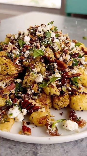 Cauliflower Date Salad, Roasted Cauliflower With Pecans Feta And Dates, Roasted Cauliflower With Feta, Roasted Cauliflower With Pecan Feta And Date Crumble, Caitlin Latessa Greene, Date Crumble, Garlic In The Oven, Eating Green, Roasted Cauliflower Salad