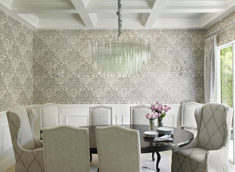 White and gray dining room features top half of walls clad in gray and black damask wallpaper and bottom half of walls clad in wainscoting. Movie Dress Up Ideas, Crown Molding Ideas, Wainscoting Height, Versace Wallpaper, Installing Wainscoting, Mahogany Flooring, Dining Room Layout, Emily Henderson Design, Wainscoting Ideas