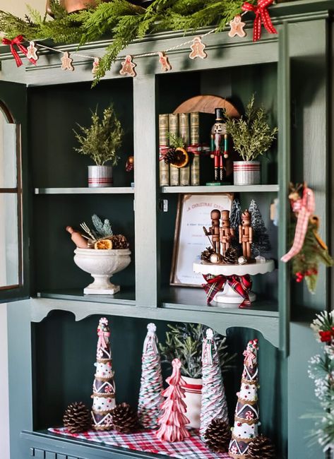 China Display Hutch, Hutch Decorated For Christmas, Hutch Christmas Decorating Ideas, Christmas Hutch Decorating Ideas, Christmas Hutch Decor, Christmas Hutch, Dark Green Paint, Hutch Styling, Christmas Dinnerware Sets