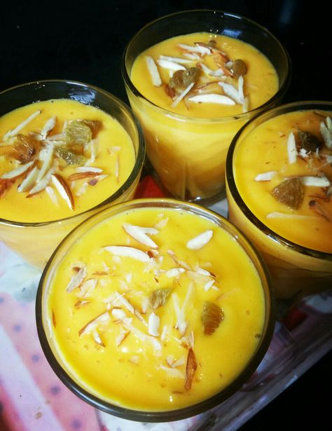 2 Mango, 4 Spoon Sugar, 1 glass Milk, 7-8 icecubes, 4-5 Chopped Badam &  Raisins for garnishing. Badam Shake, Basic Math, Diy Food, Diy Food Recipes, Raisin, Milk Glass, Mango, Cooking Recipes, Milk