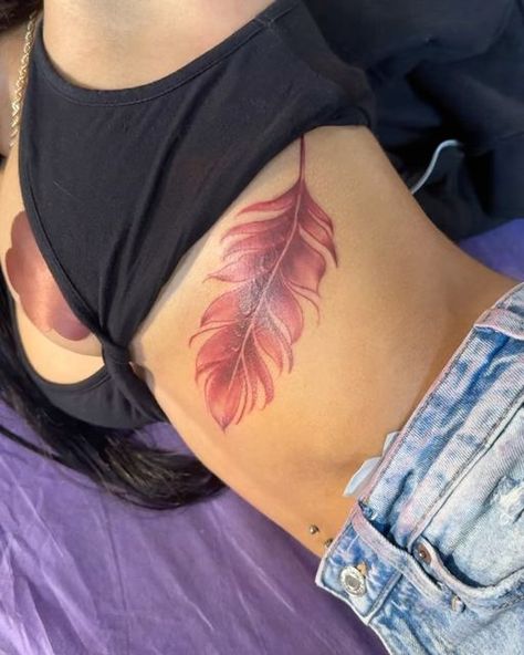 Steven Kilo Abrams on Instagram: "Blessed my friend with this super cute red feather (damn near all her tattoos are red 😂) @evadiamondj" Feather Tattoos Underboob, Feather Underboob Tattoo, Red Feather Tattoo, Underboob Tattoo, Red Ink Tattoos, Red Tattoos, Feather Tattoo, Red Feather, Spine Tattoos