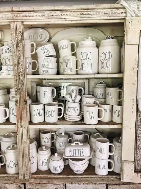 My Rae Dunn Collection & FAQ’s Rae Dunn Display, Rae Dunn Mugs, Kitchen Decals, Booth Decor, Liz Marie Blog, Rae Dunn Collection, Coffee Bars, Coffee Bar Home, Country Decorating