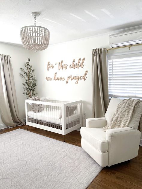 Neutral Nursery for boy or girl #genderneutralnursery #nurserydecor #nursery #nurseryideas #babyboy #babygirl #homedecorideas #homedecoration Nursery With Tan Walls, Pottery Barn Nursing Chair, Neutral Calm Nursery, Newborn Nursery Ideas Neutral, Off White Nursery Walls, Plain Nursery Ideas, Nursery Room Idea, Clean Nursery Ideas, Neutral Nursery For Girl