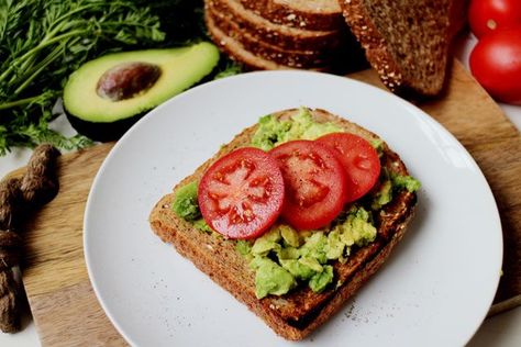 It's no secret that we love avocado toast here at Refinery29. A lot of the time, we're guilty of ordering it at restaurants, when it could just as easily be made at home. There's something about the combination of crunchy bread and smooth avocado that's just too good to pass up.  That's why we Heart Healthy Diet Plan, Wheat Belly Recipes, Mediterranean Diet Meal Plan, Mediterranean Diet Plan, Heart Healthy Diet, Toast Toppings, Low Carbohydrate Diet, Diet Vegetarian, Vegetarian Cooking