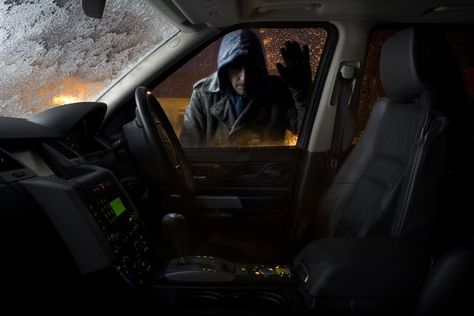 car thief looking into parked car Car Thief, Rfid Blocking Wallet, Car Key Fob, Radio Frequency, Land Rover Discovery, General Motors, Radios, Land Rover, Kansas