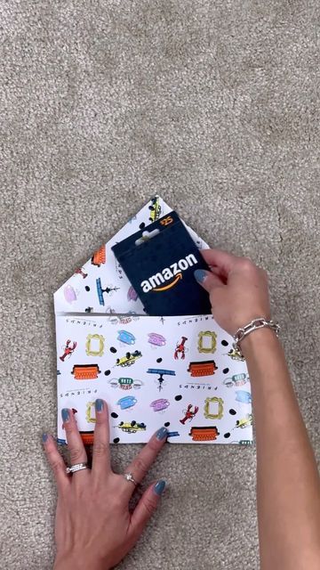 LENNIA (Folding Queen 👑) on Instagram: "How to gift wrap a gift card #giftwrappinghacks #giftideas #xmas" How To Wrap A Gift Card With Wrapping Paper, How To Wrap A Paper Gift Certificate, How To Wrap A Gift Card For Christmas, How To Wrap Gift Cards For Christmas, How To Wrap Gift Cards, Wrapping A Gift Card, How To Wrap A Gift Card, Giftcard Wrapping Ideas Creative, Gift Card Wrapping Ideas