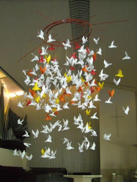 Origami Doves |  (First Presbyterian of St. Petersburg, FL)  really cool origami mobile in their sanctuary. Pentecost Craft, Cool Origami, Origami Dove, Pentecost Sunday, Origami Mobile, Worship Art, Origami Wedding, Church Stage Design, Church Stage