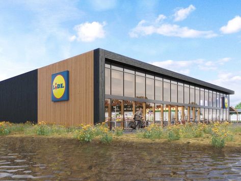 On Wednesday, Lidl opened the "most sustainable supermarket of the Netherlands" in the city of Almere. The store is not only energy and CO2 neutral, but was also built with sustainable and circular materials. Supermarket Facade, Green Zone, Sewage System, Green City, Green Roof, Facade Design, Ecology, Solar Panels, The Netherlands