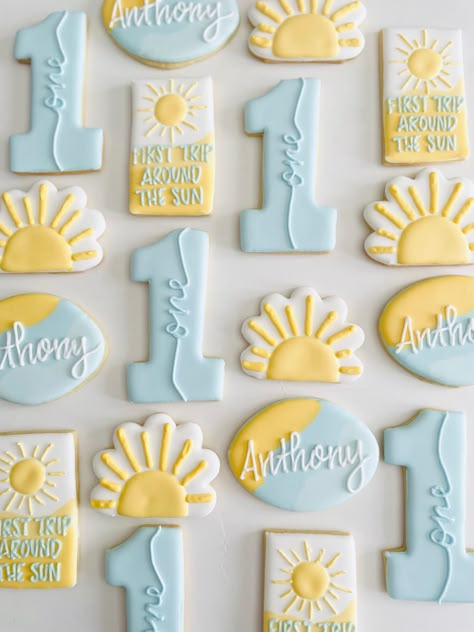 First Year Around The Sun Birthday Cookies, Sunny One Birthday, One In The Sun Cookies, Sun Themed First Birthday Party, Golden First Birthday Boy, Sunshine First Birthday Boy, One In The Sun First Birthday, Sun Sugar Cookies, First Birthday Sugar Cookies