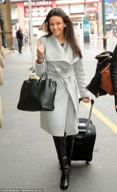 Wrapped up: Michelle wore a chic and cosy outfit of a wraparound grey coat, leather long boots and a black tote bag as she met fiance Mark Wright in Glasgow Grey Wrap Coat Outfit, Christmas Light Outfit, Light Grey Coat Outfit, Wrap Coat Outfit, Grey Wrap Coat, Grey Winter Coat, Mark Wright, Long Leather Boots, Cosy Outfit