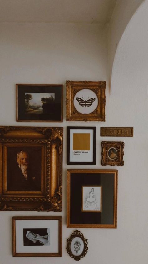 Dark Academia Framed Pictures, Feature Wall Ideas Photos, Gallery Wall Antique Paintings, Black And White Photo Gold Frame, Black And Gold Frames On Wall, Vintage Photos Gallery Wall, Gold Frame Gallery Wall Vintage, Gold Wall Gallery, Picture Frame Corner Wall