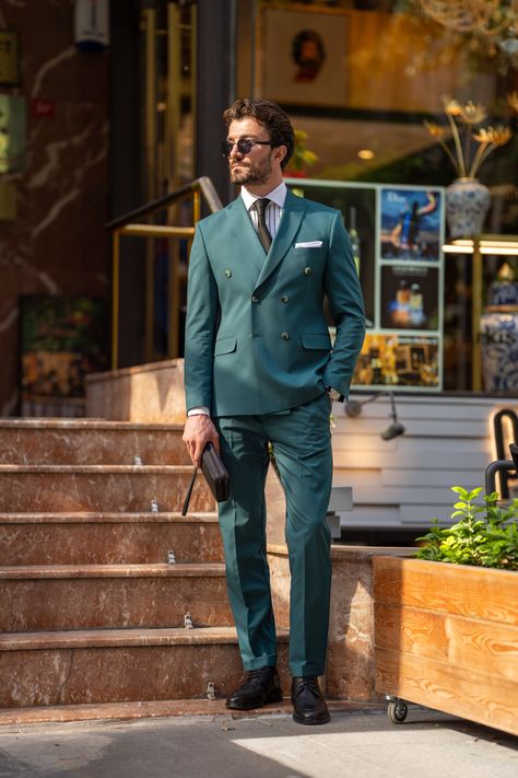 Embrace elegance in our Green Double-Breasted Suit 2-Piece. The refined 6-button blazer, adorned with peak lapels, complemented by trousers, creates a tasteful and distinguished attire for various formal events. #greensuit #doublebreasted #formalattire #suits #mensfashion #peaklapels #elegance #tailoredfit Green Double Breasted Suit, Olive Suit, Graduation Suit, Double Breasted Suit Men, Brown Suede Chelsea Boots, Wedding Fits, Brown Leather Chelsea Boots, Suit Styles, Double Breasted Tuxedo