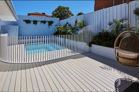 Black Pool Fence, Extension Aesthetic, White Fence Pool Area, Pool With White Fence, White Pool Fence Ideas Australia, Curved Pool Fence, Outdoor Entertaining Area Pool, Pool Fence Ideas Australia, Timber Pool Fence Ideas Australia