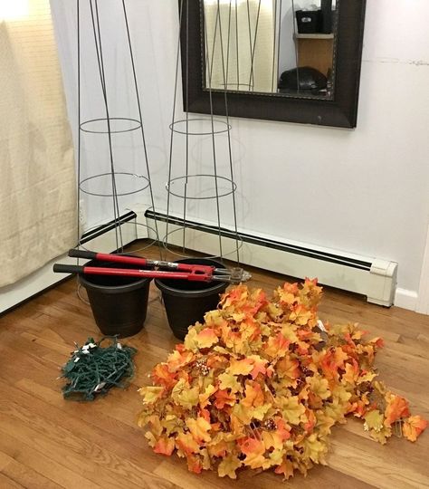 She grabs 2 tomato cages from outside and wait until you see this gorgeous living room idea! Fall Tomato Cage Crafts, Fall Topiary, Tomato Cage Crafts, Fall Topiaries, Diy Halloween Dekoration, Cheap Fall Decor, Fall Leaf Garland, Fall Fireplace, Pumpkin Topiary